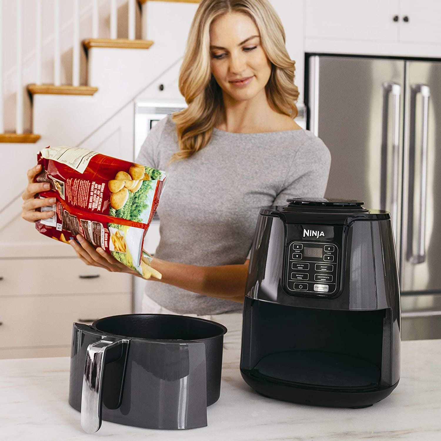 Ninja Air Fryer. Roast. Bake. Air Fry. Roast. Broil. Reheats. & Dehydrates. 4-In-1. Fries. Frozen Food. Veggies. and Juicy Meat. Less Oil. Easy Meals. Healthy Meals. Compact. 4 QT. Grey. AF101 - Image 9