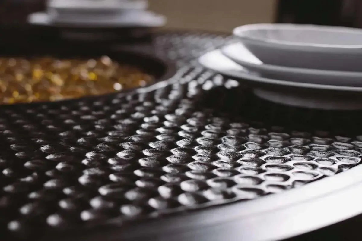 Castelle Classical 49 Round Fire Pit Dining Table with Forged Top and Antique Dark Rum Finish - Image 7